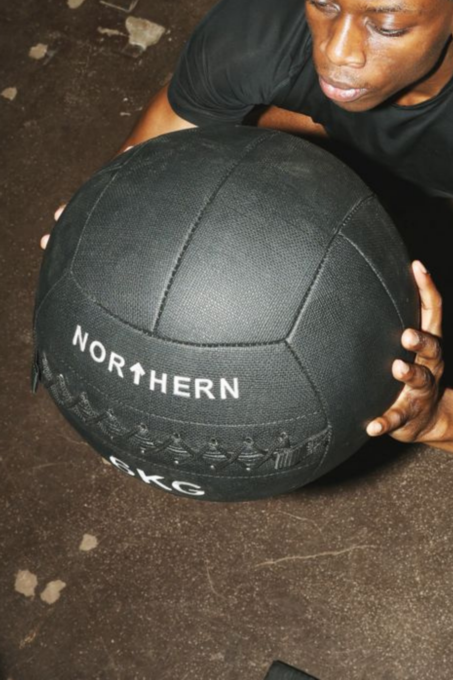 Athlete Using Northern Medicine Wall Ball for Strength Workout