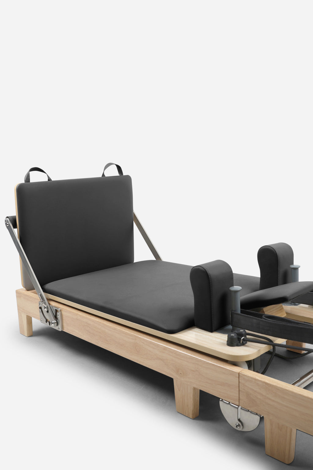 Northern Folding Reformer Bed open with padded carriage shoulder blocks and foot platform