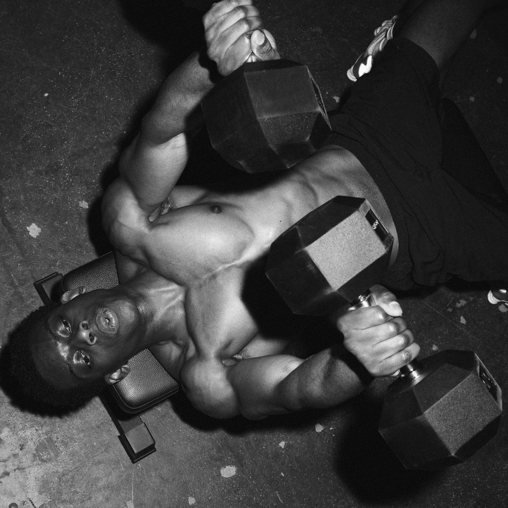 Ongoing Bench Press Exercise using Hexagon Dumbbells