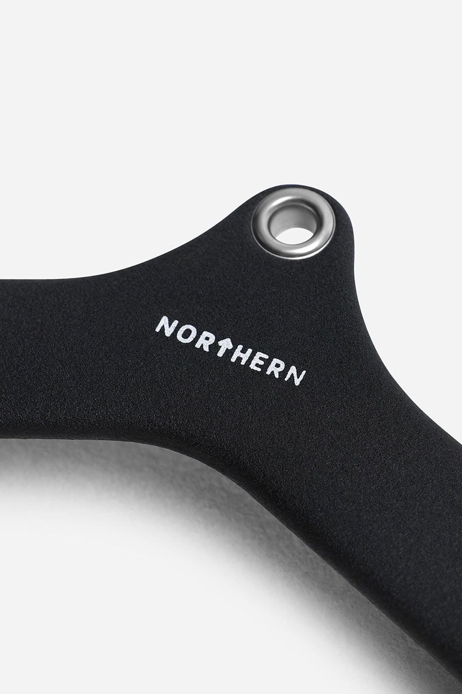 Detailed close-up of textured powder-coated angled lat pulldown bar with reinforced eyelet