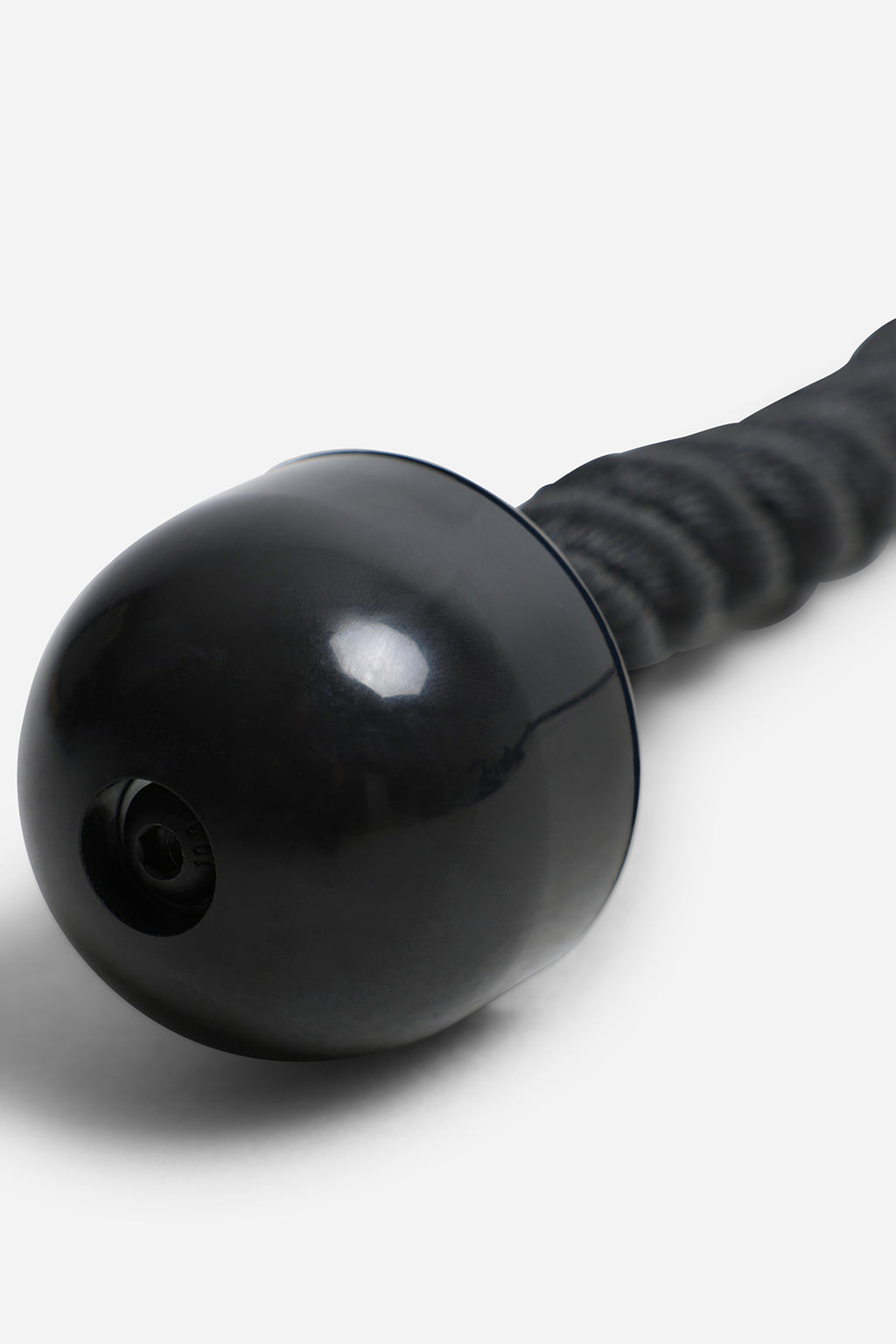 Close-up of moulded rubber ball end for secure cable training