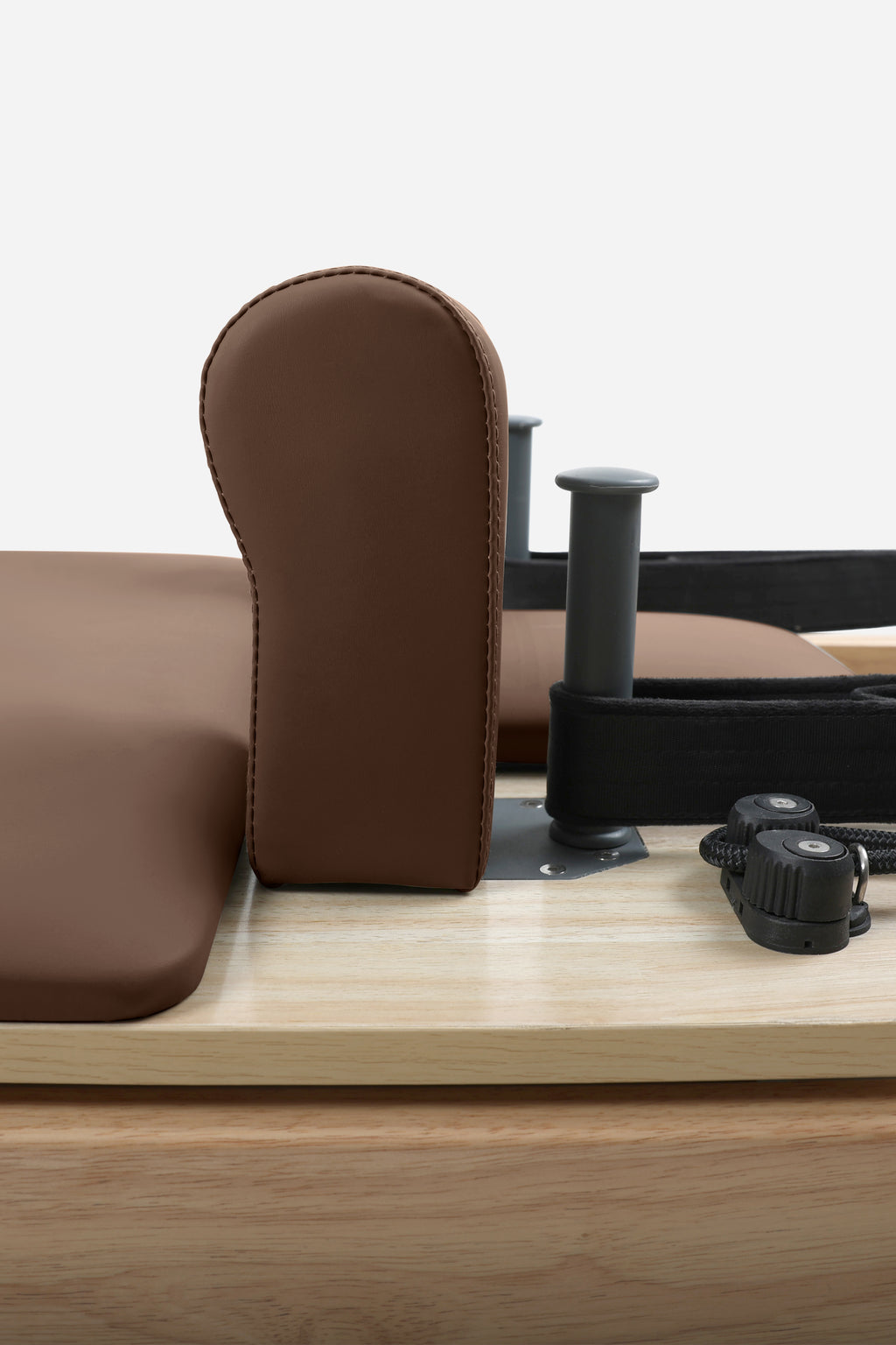 Northern Folding Reformer Bed padded shoulder block and adjustable rope components close-up