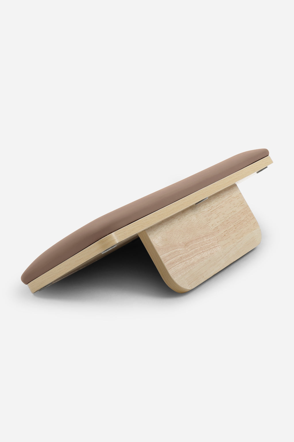 Northern Folding Reformer Bed jump board shown raised on wooden support