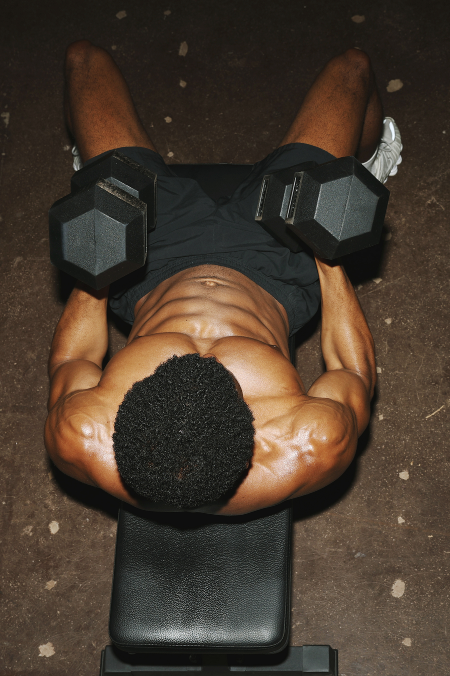 Dumbbell bench press using rubber-coated Northern hex dumbbells on a weight bench