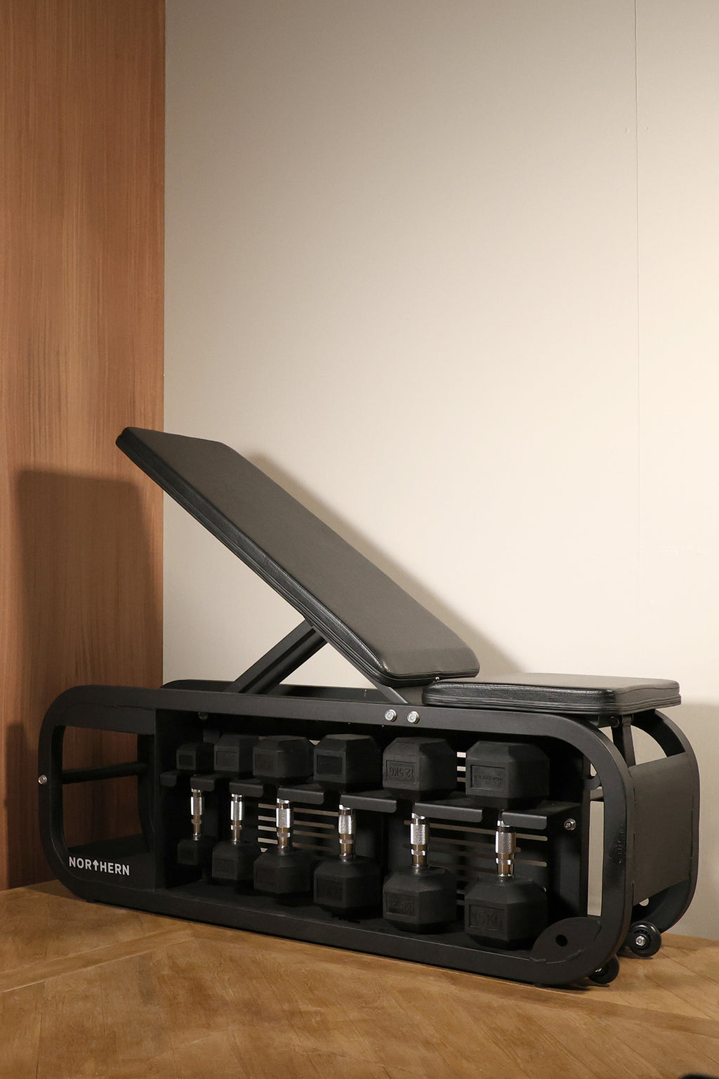 Lifestyle image of Northern Hex Dumbbell Set 2.5-15kg with Storage Bench
