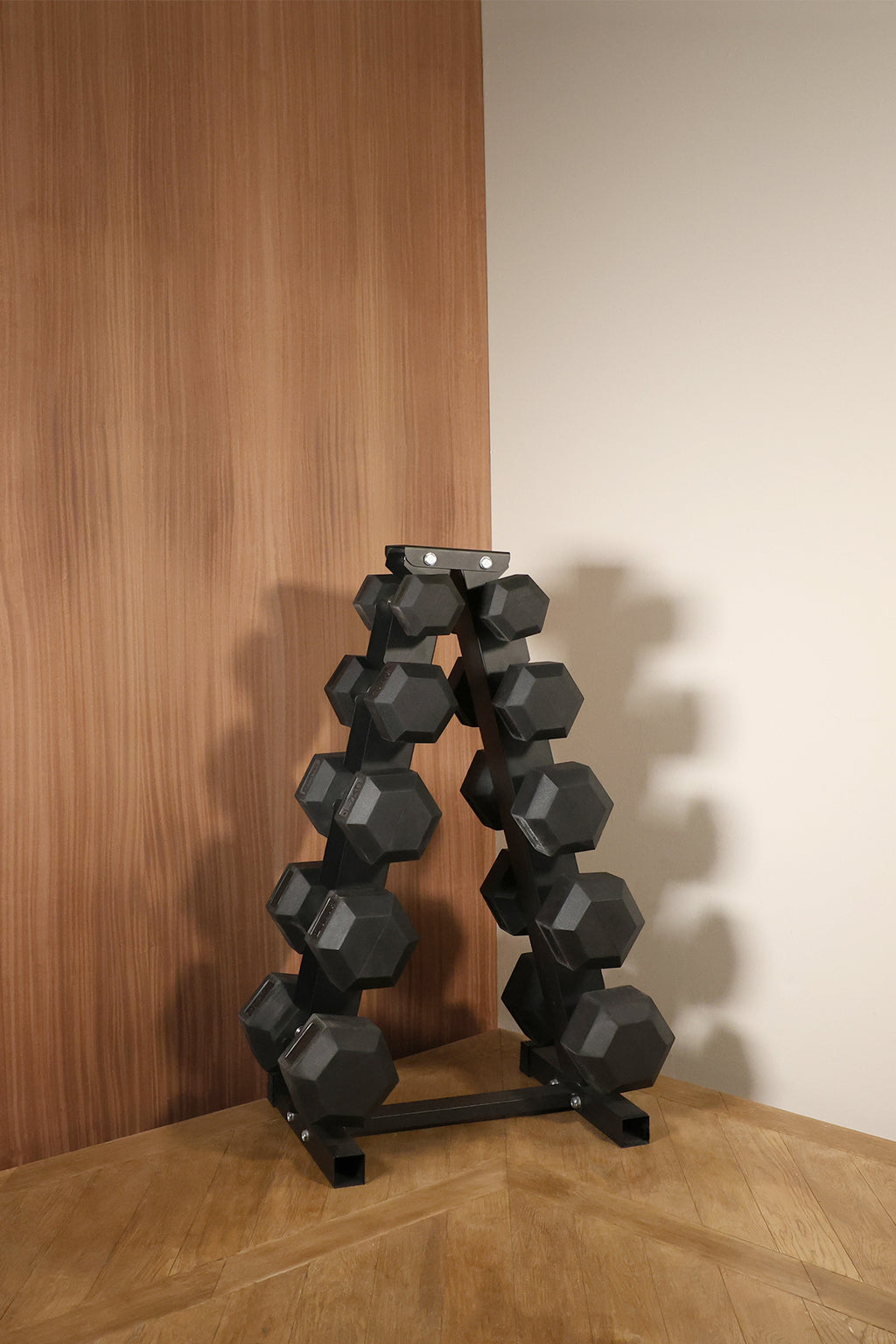 Lifestyle Image of Northern Hex Dumbbell Set 5-25kg with Large 5-Tier A-Frame Rack