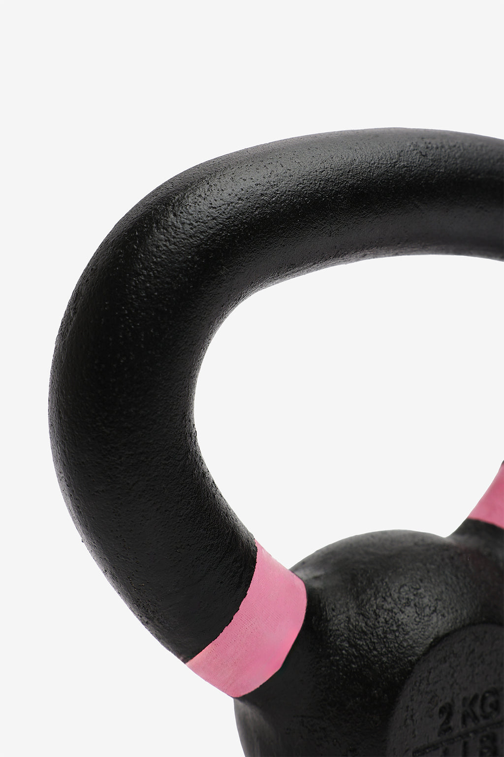 Black kettlebell with pink grips on a white background
3