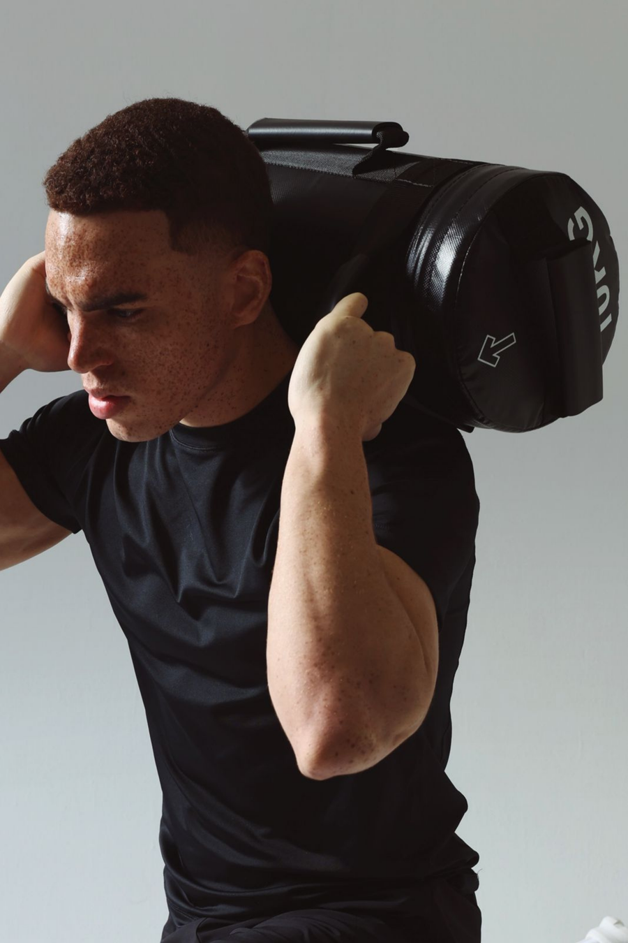 Man Performing Sandbag Workout Using Northern Sandbag
