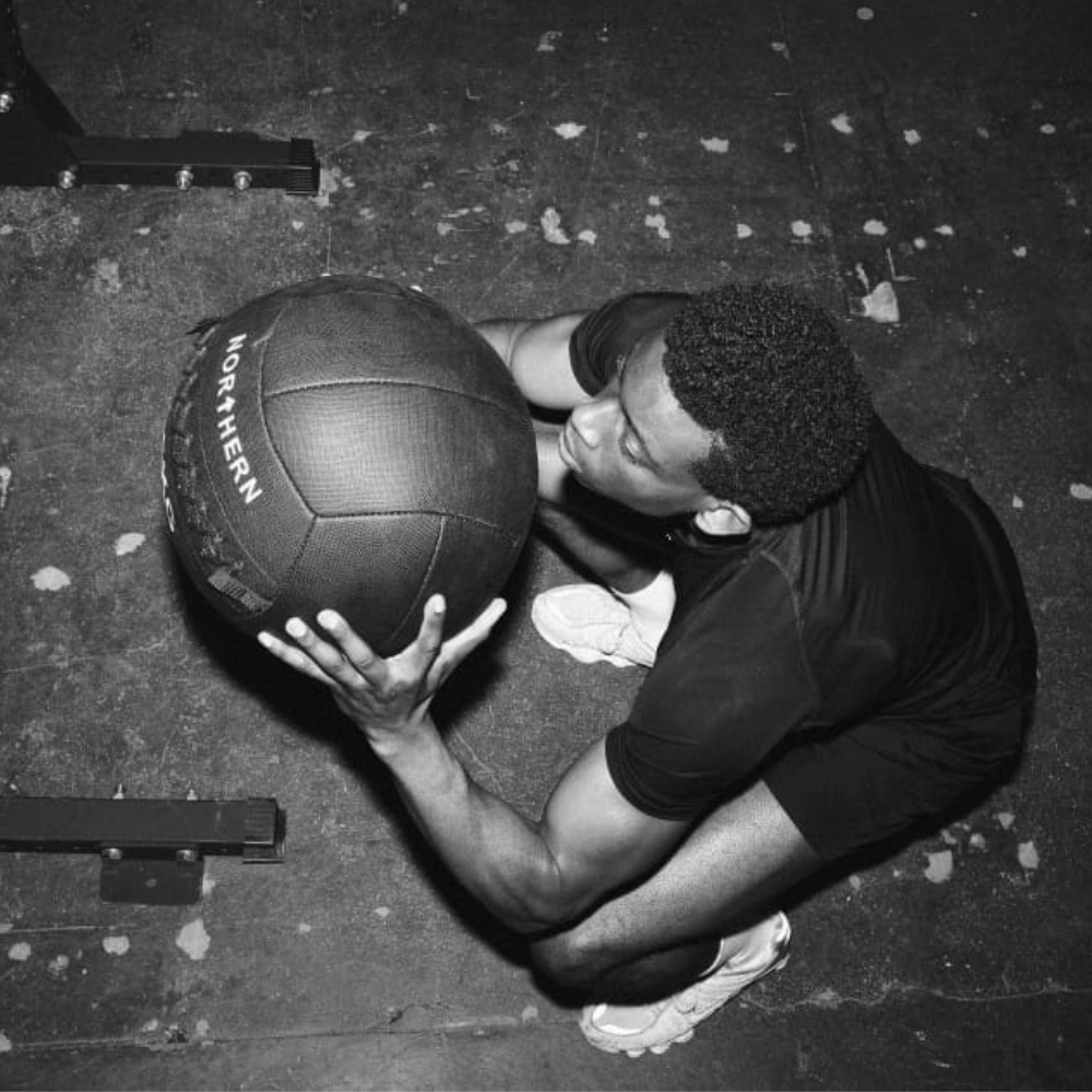 Performing Squat Exercise Using Northern Exercise Ball