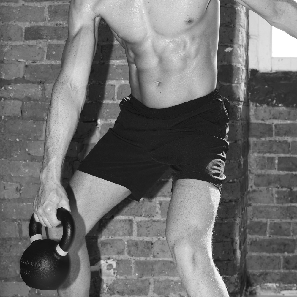 Powder coated kettlebell use in kettlebell swing workout