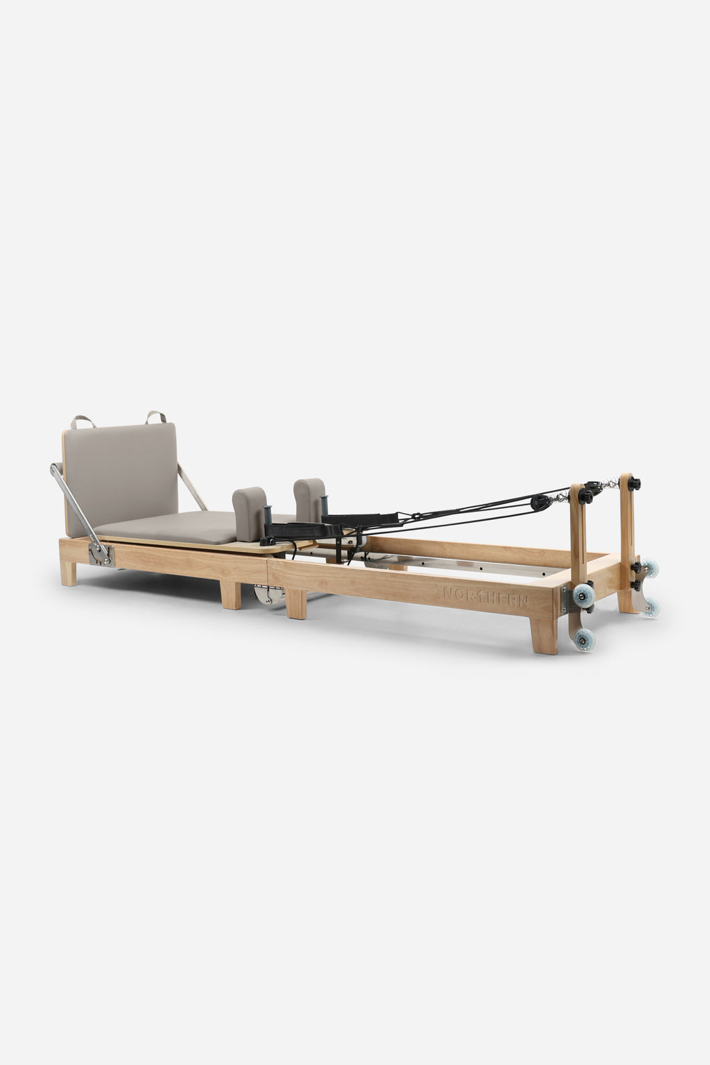Northern Folding Reformer Bed full-size Pilates reformer with spring resistance ropes and shoulder blocks