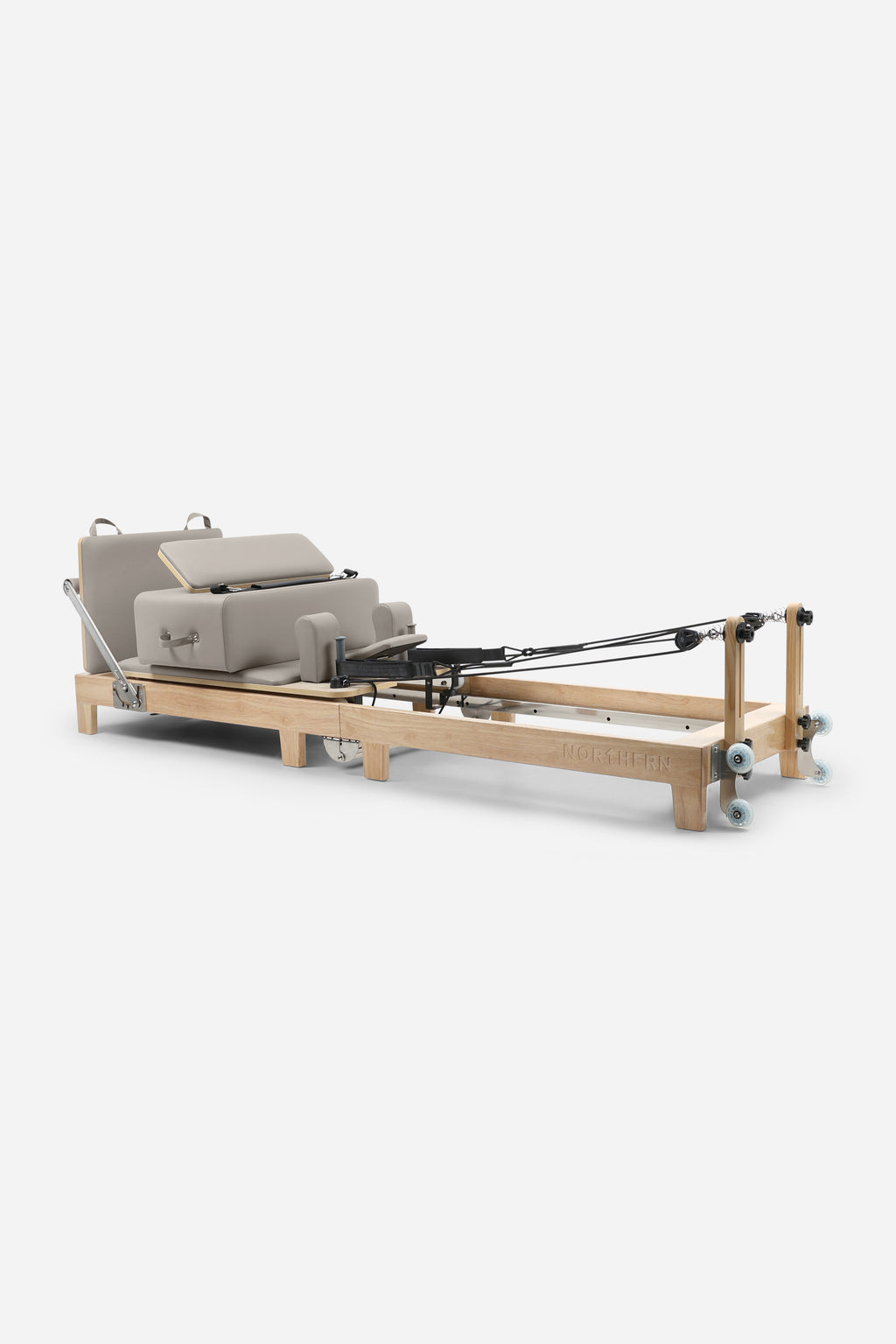 Northern Folding Reformer Bed Pilates reformer fully extended with box and resistance ropes