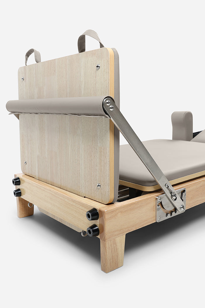 Northern Folding Reformer Bed rear view showing rubberwood frame padded carriage and adjustable footbar
