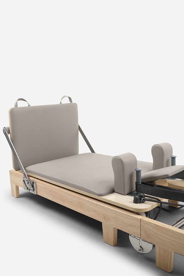 Northern Folding Reformer Bed open with padded carriage shoulder blocks and foot platform