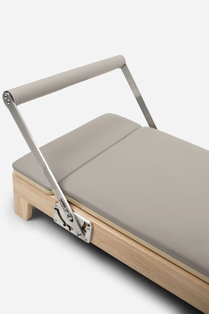 Northern Folding Reformer Bed padded carriage with adjustable footbar and rubberwood frame