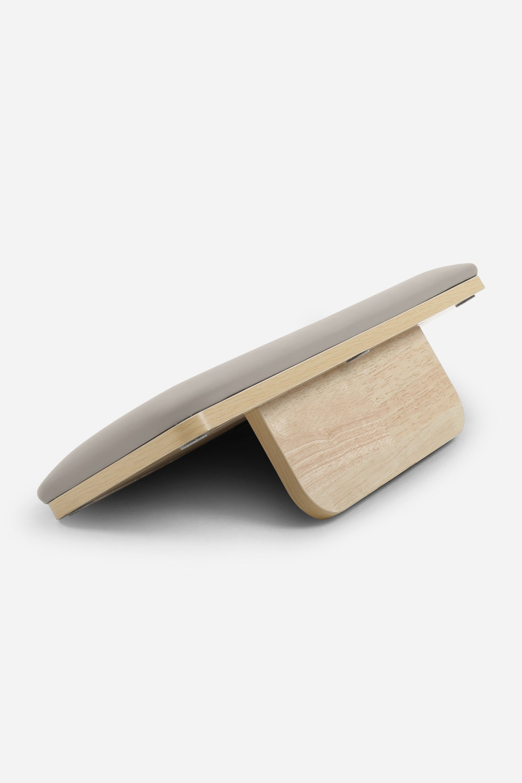 Northern Folding Reformer Bed jump board shown raised on wooden support