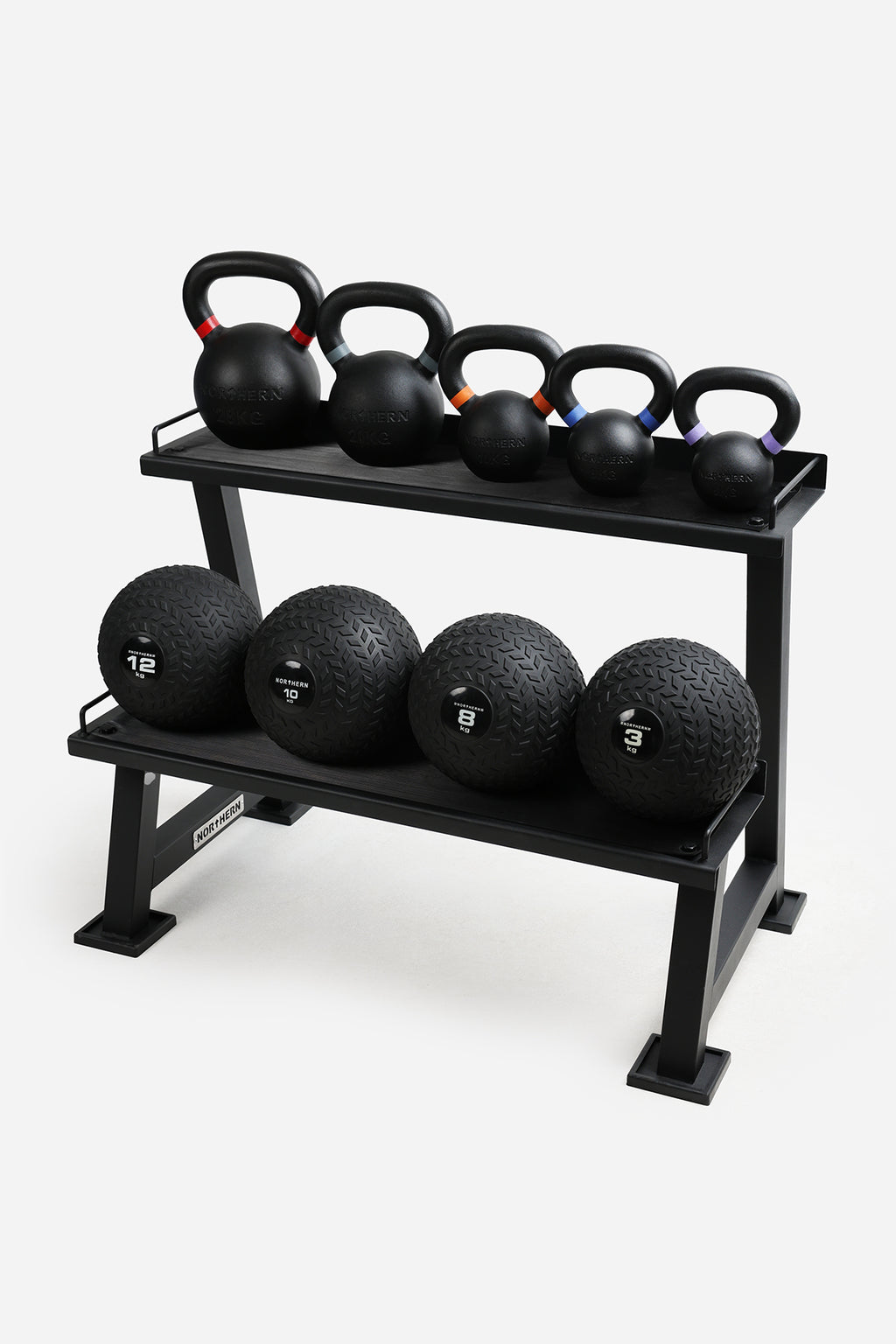 Black metal rack with kettlebells and medicine balls on a white background