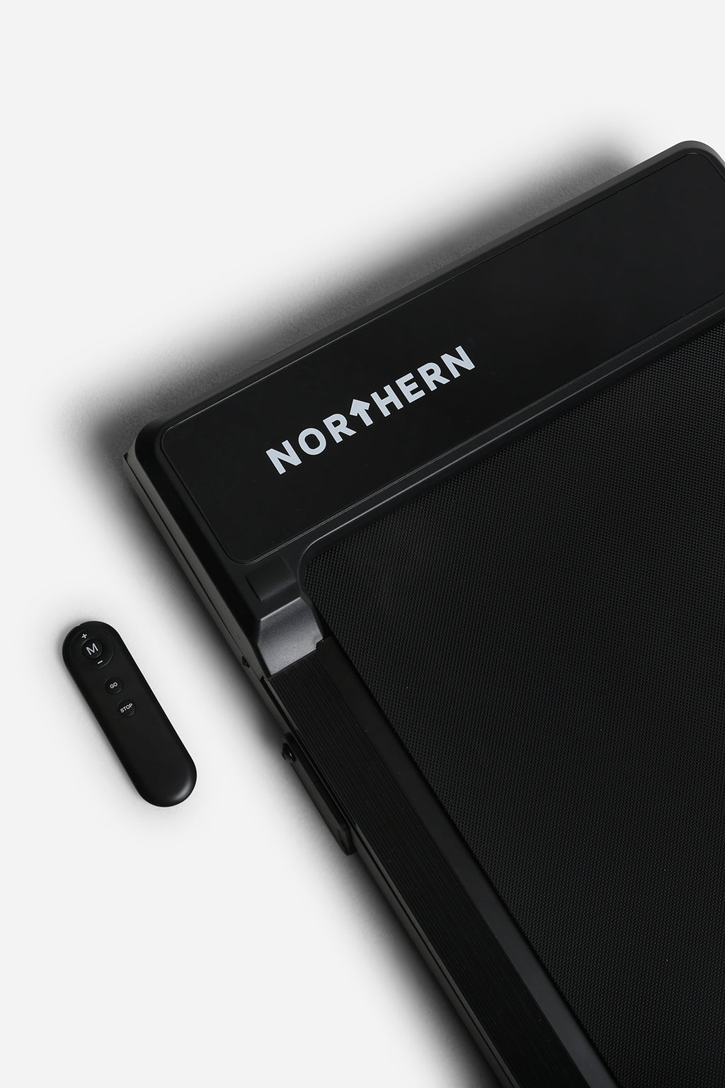 Northern Folding Walking Pad close-up with remote control and textured walking surface