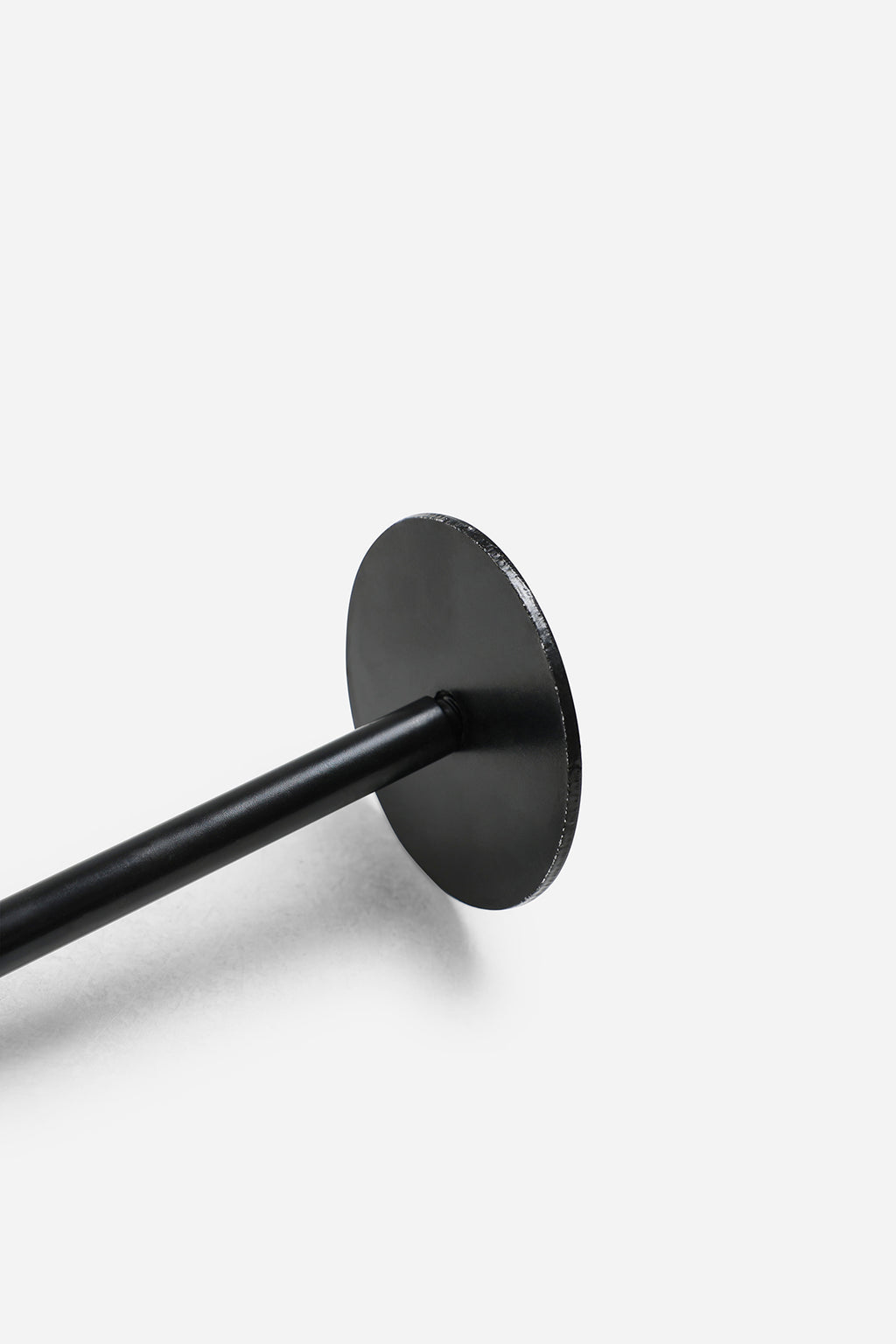 Close-up of weight-loading pin on wrist roller attachment