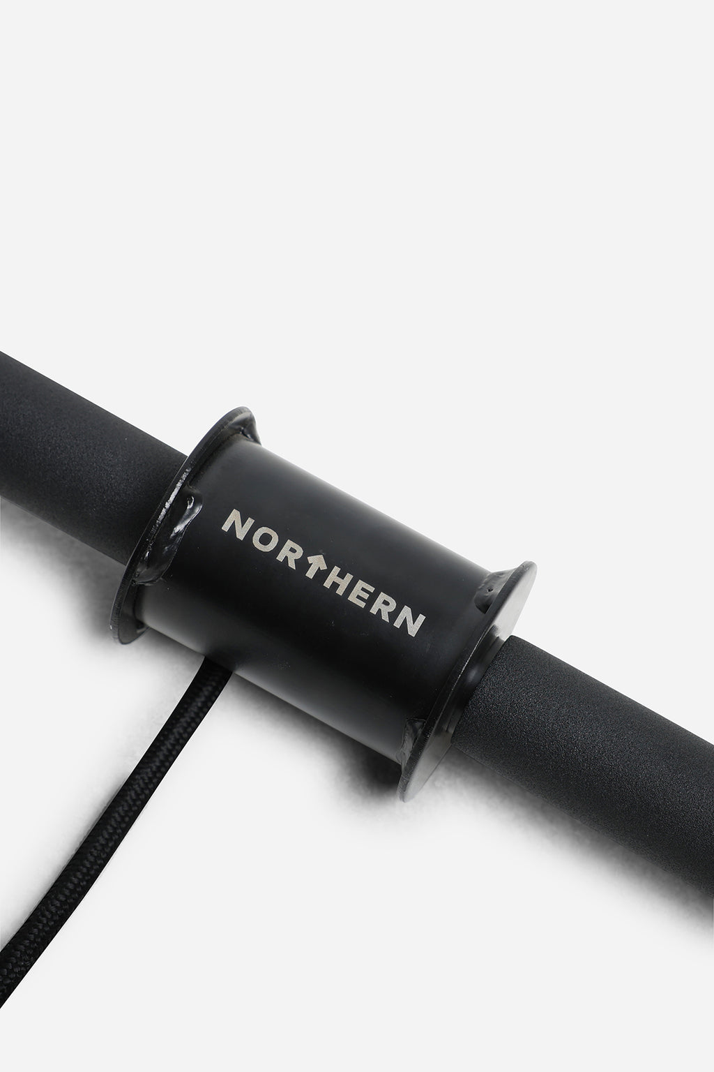 Close-up of Northern wrist roller centre spool, padded grip and braided rope